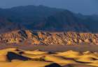 Dramatic sunset light on the Mesquite Sand Dunes in Death Valley National Park, California, USA. Art Print